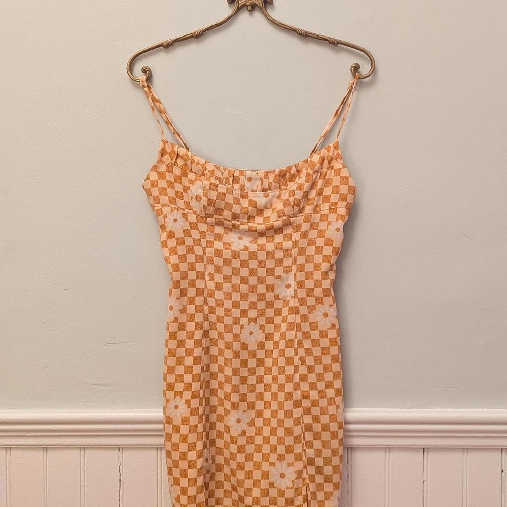 Orange and cream checkered floral mini dress.